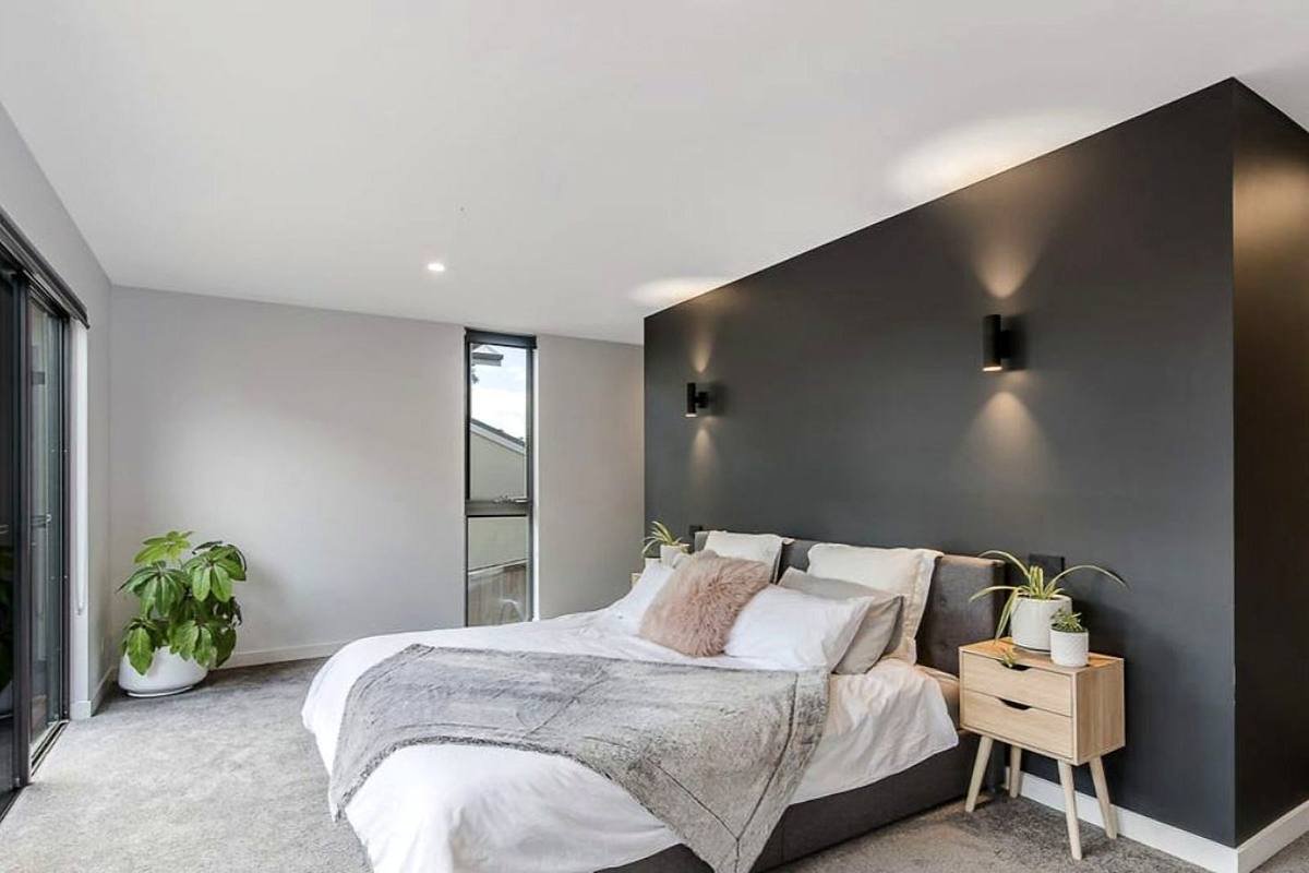 Fort Direction new residence, main bedroom with dark feature wall, built by LHPL Contracting