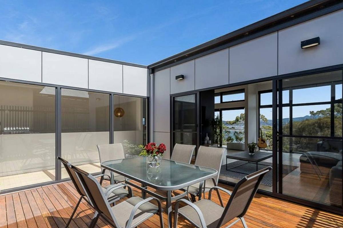 Fort Direction new residence, sheltered deck courtyard, built by LHPL Contracting